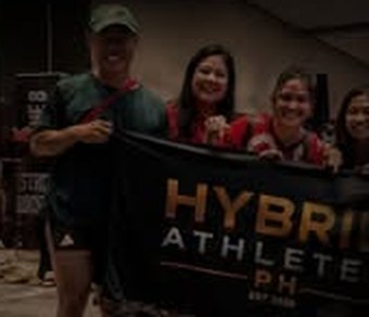 Members celebrating with the banner